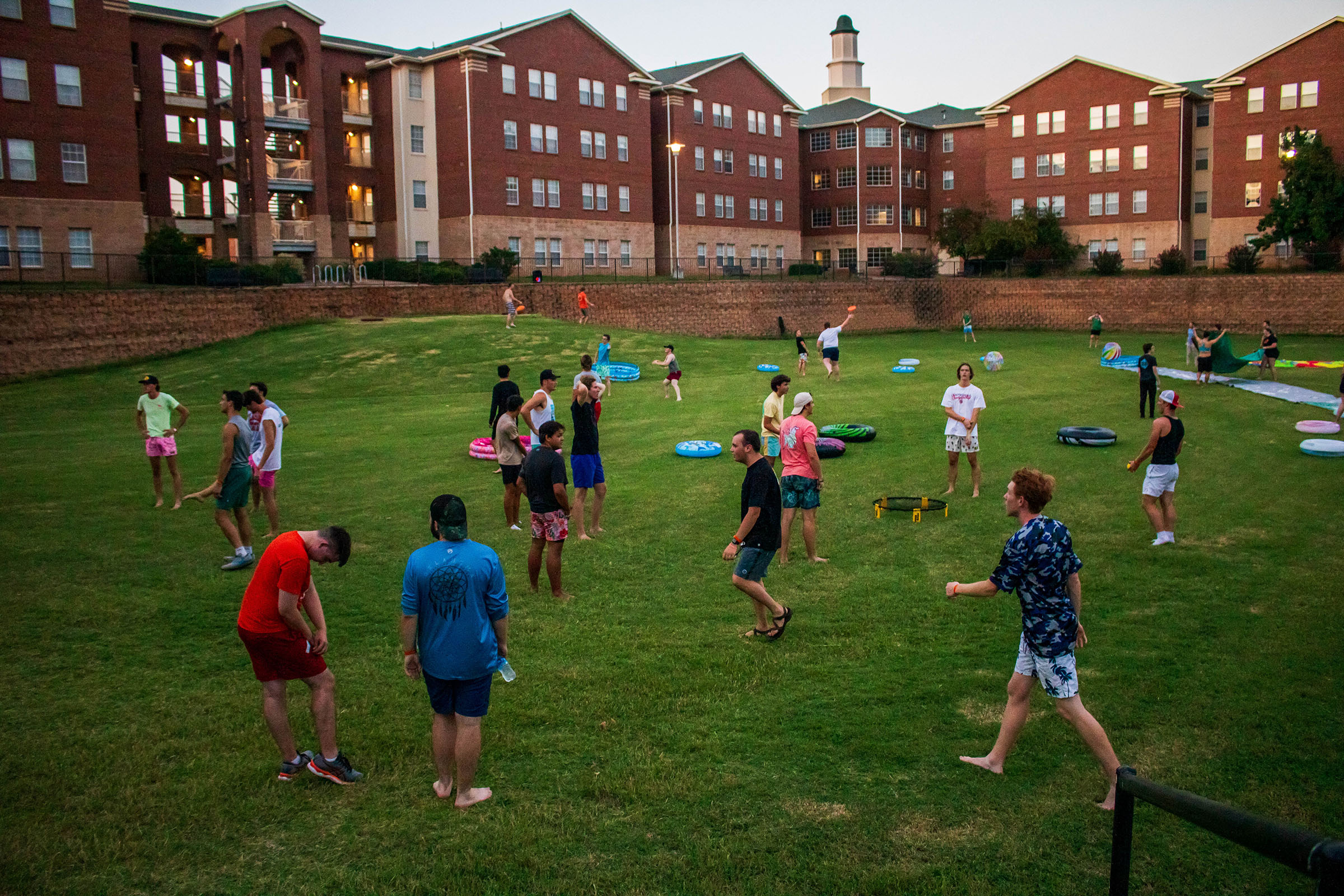 students playing kickball