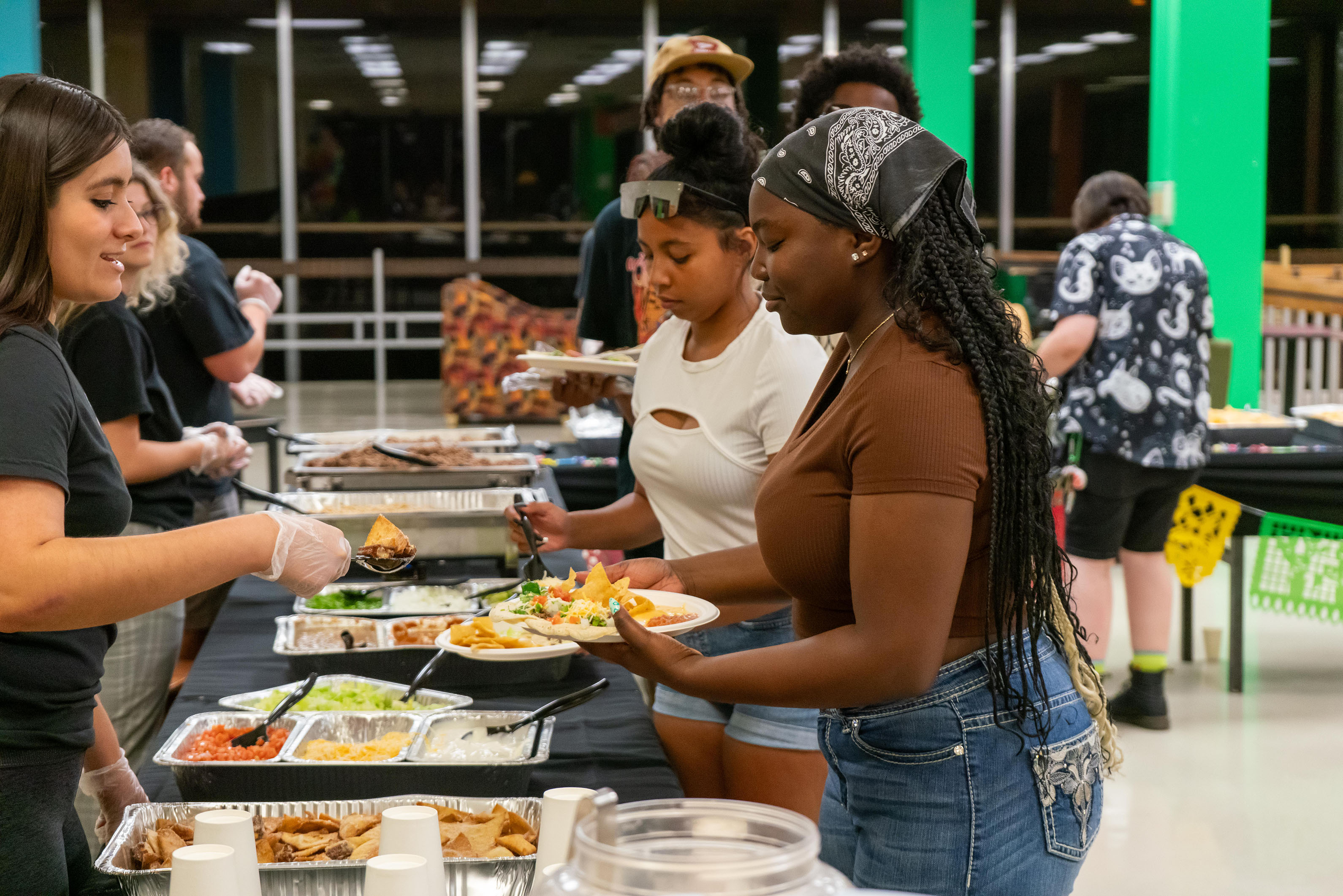 students getting food at late night event