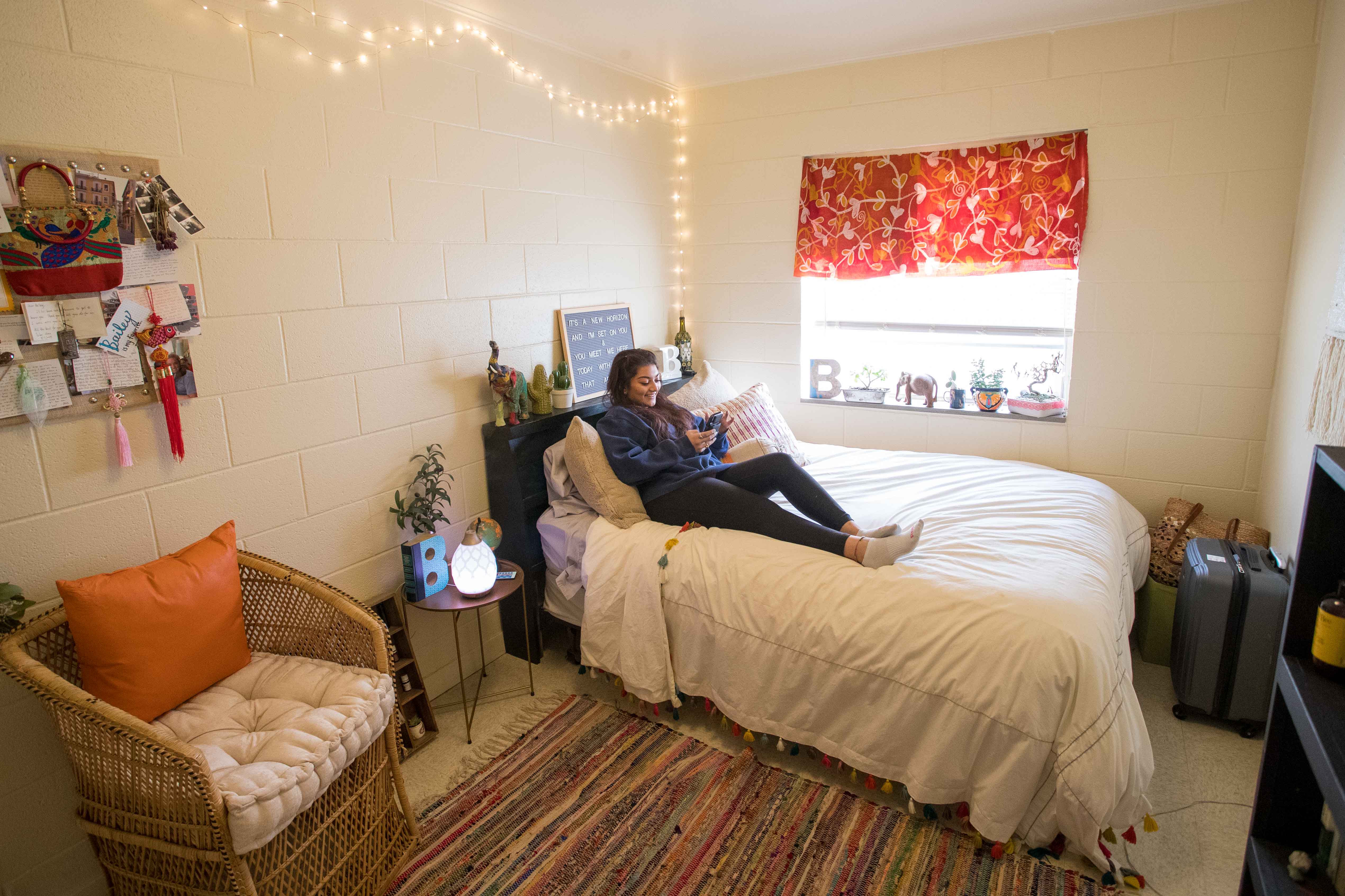 Williams Neighborhood resident on bed