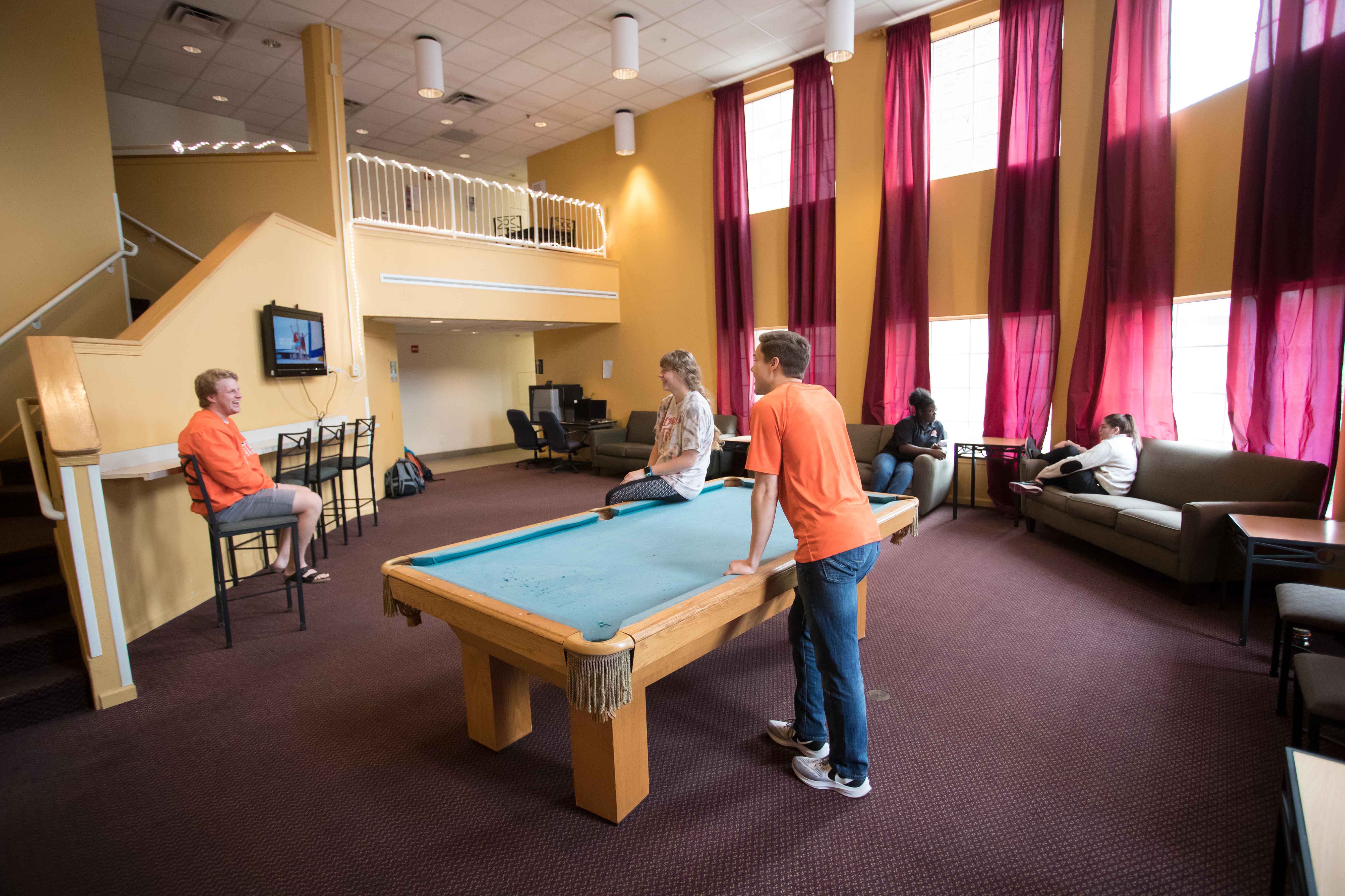 students playing pool in Patchin-Jones Hall