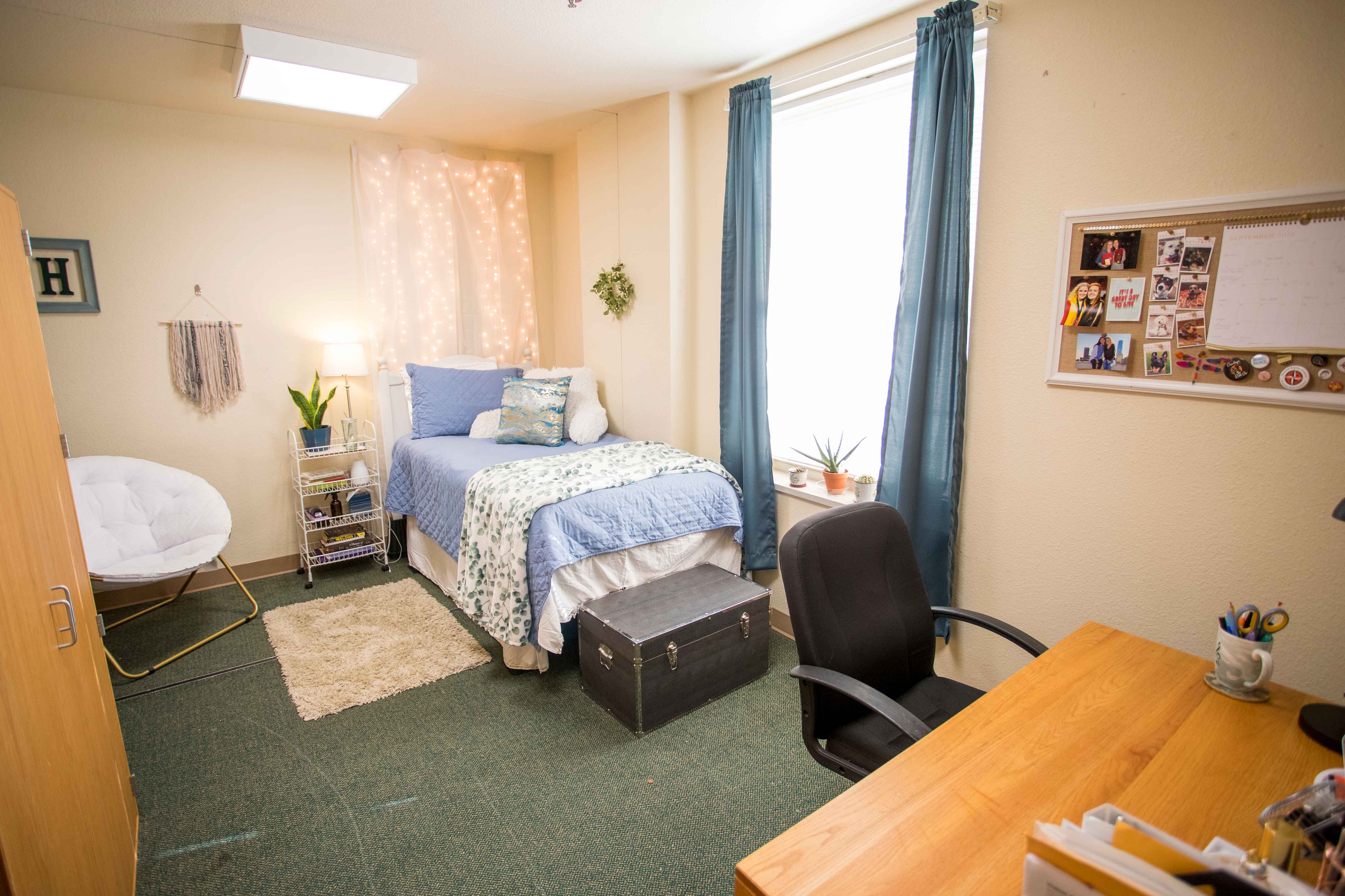Bennett Hall Bedroom decorated with fairy lights and white and blue accents